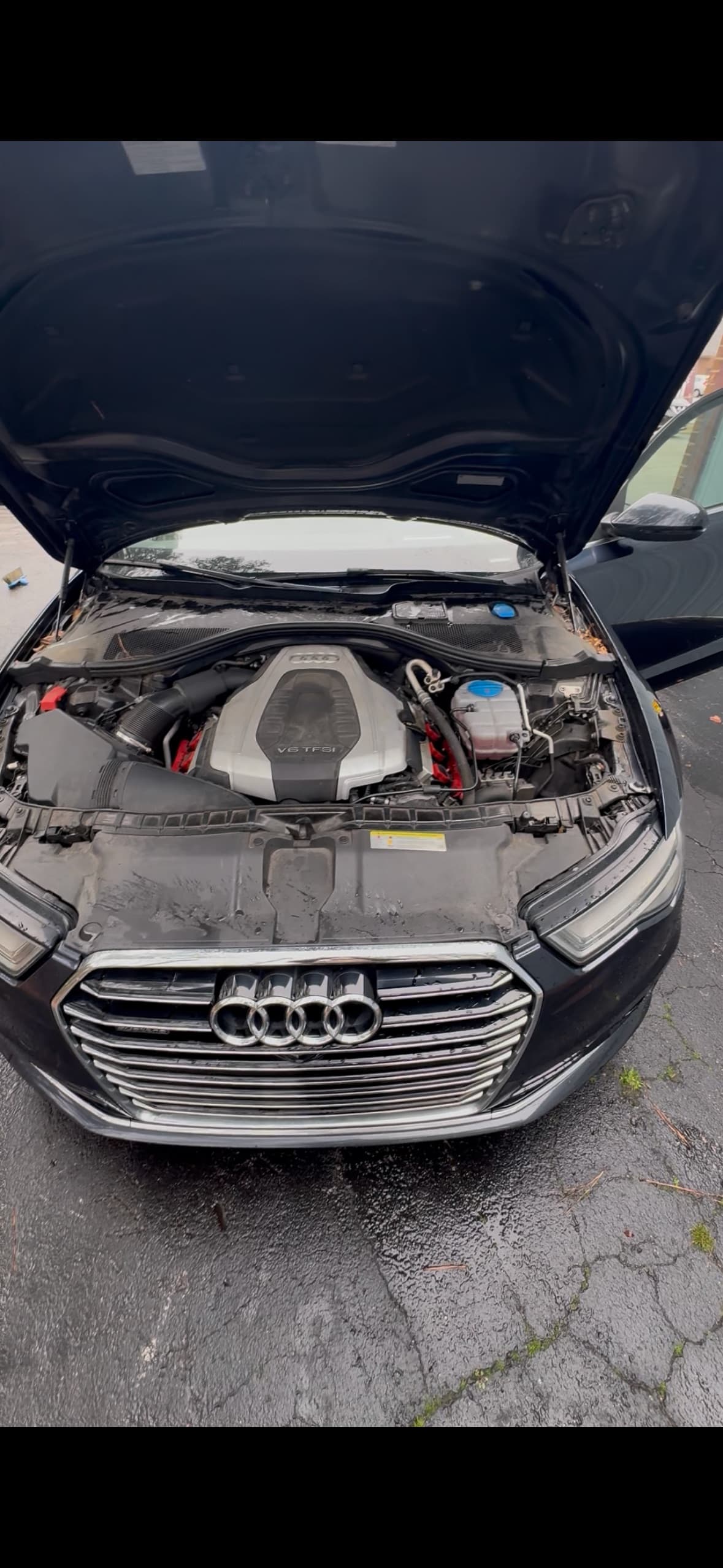 Audi engine bay before detailing